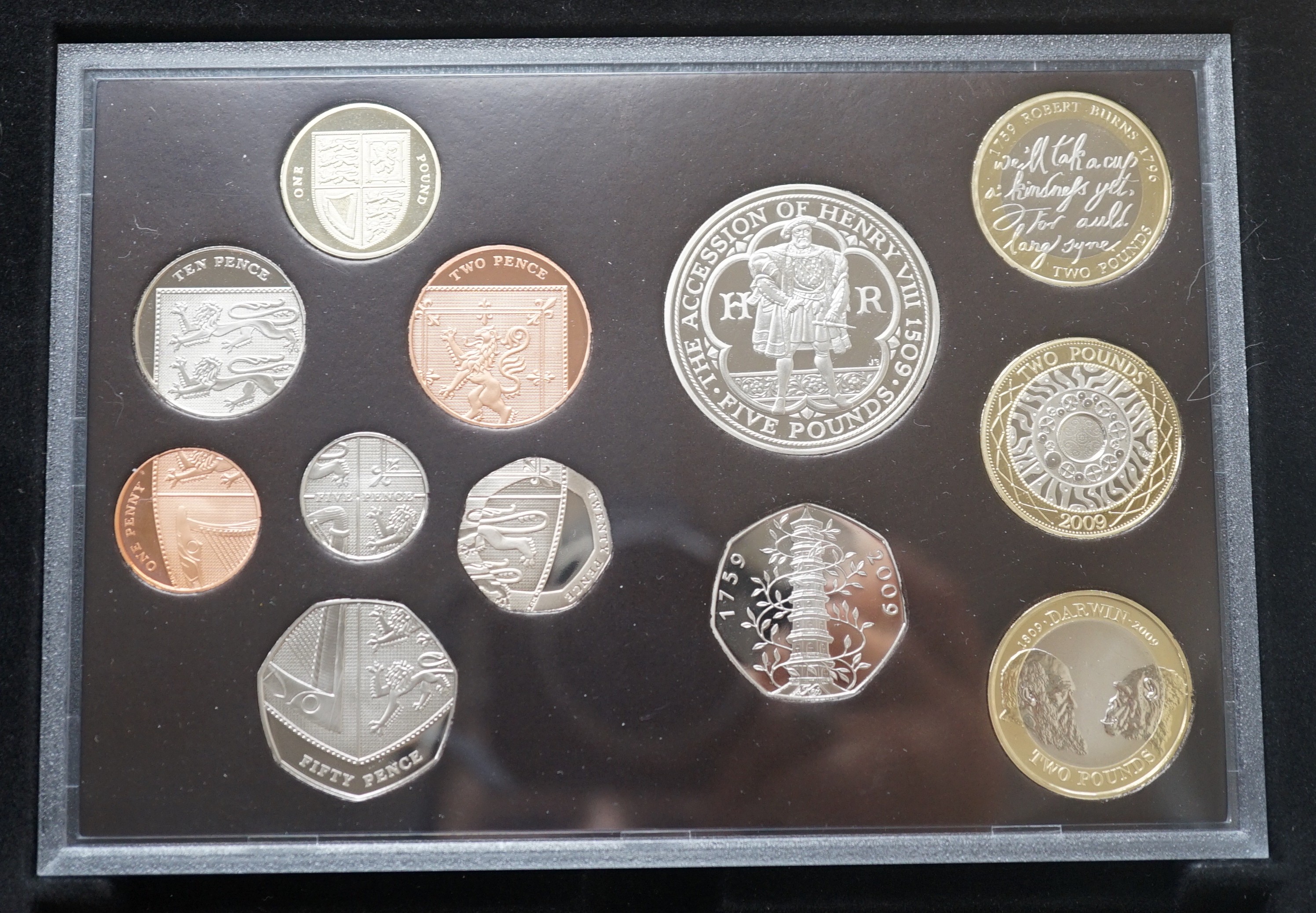 A cased Royal Mint UK proof coin year set for 2009 including the scarce Kew Gardens 50 pence